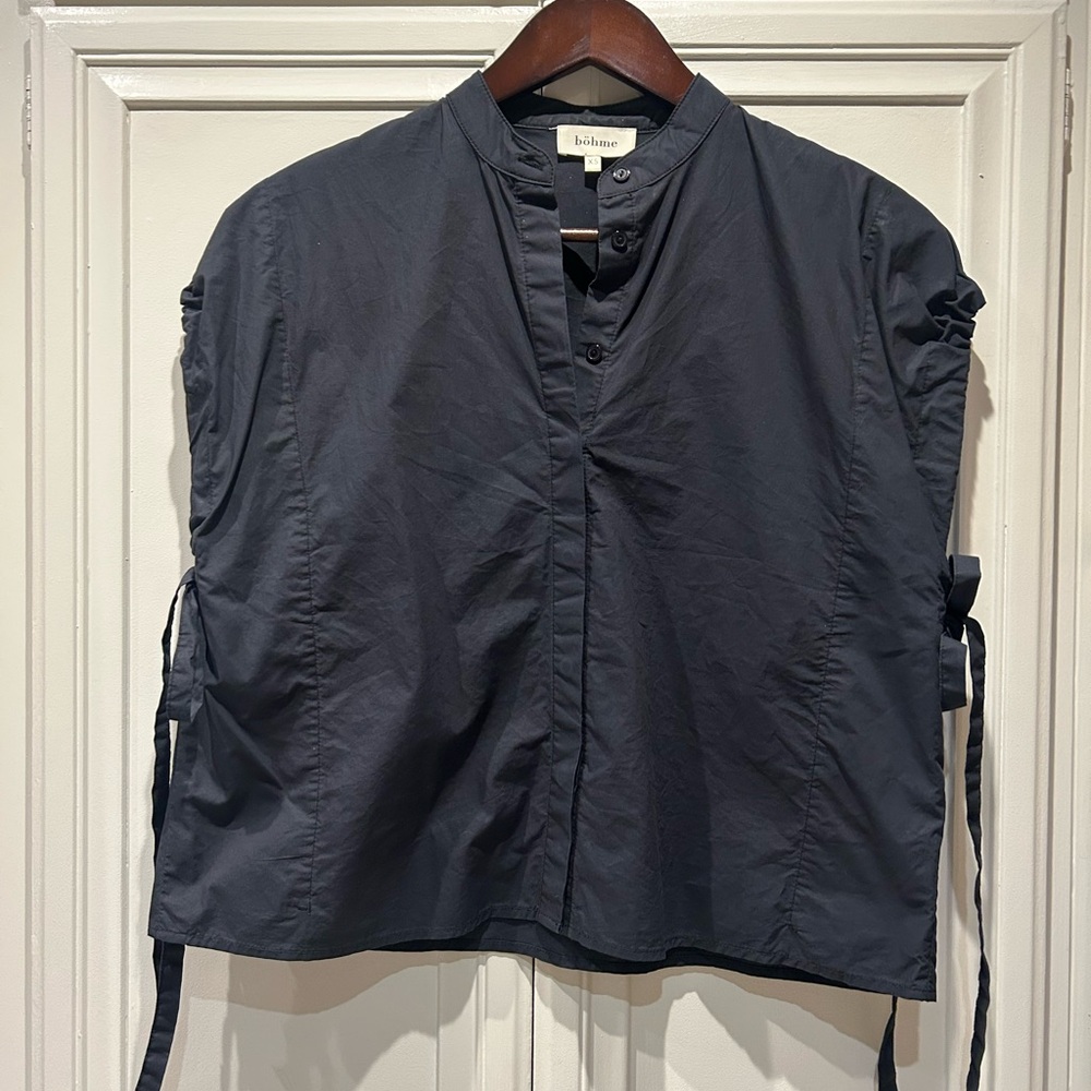 Bohme  brand boxy, black blouse with cinch sleeve ties.